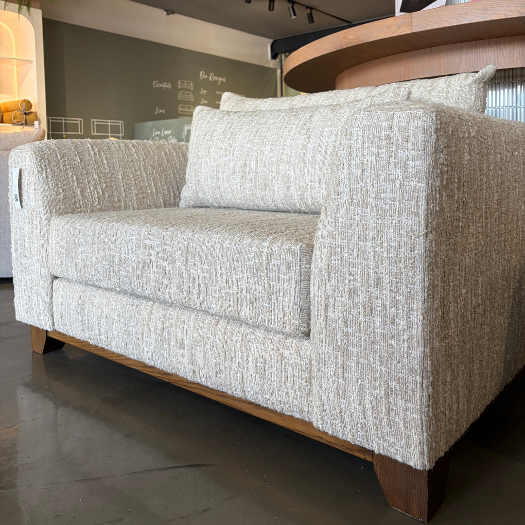 Mea sofa upholstered in exclusive Heritage Woven Biscotti textured fabric